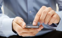 Close up of a man using smartphone